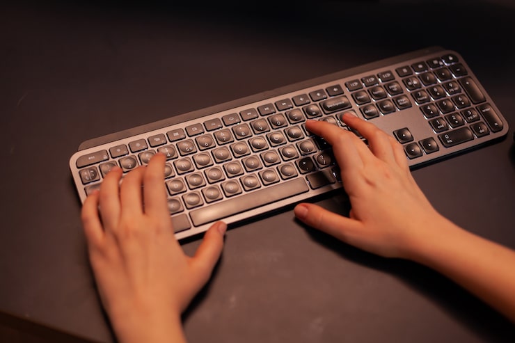 Typing on a vintage mechanical keyboard