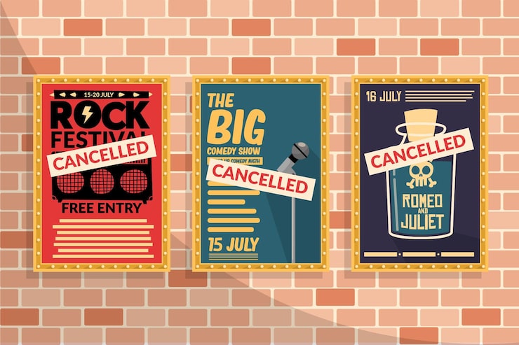 Fly posters plastered on a brick wall